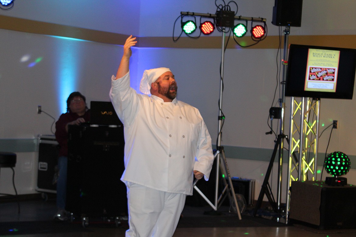 Cheryl Schweizer/Columbia Basin Herald
Chef Louis (Justin Rowland) adds a flourish to his song &#145;Les Poissons&#146; during the Columbia Basin Allied Arts soiree Friday.