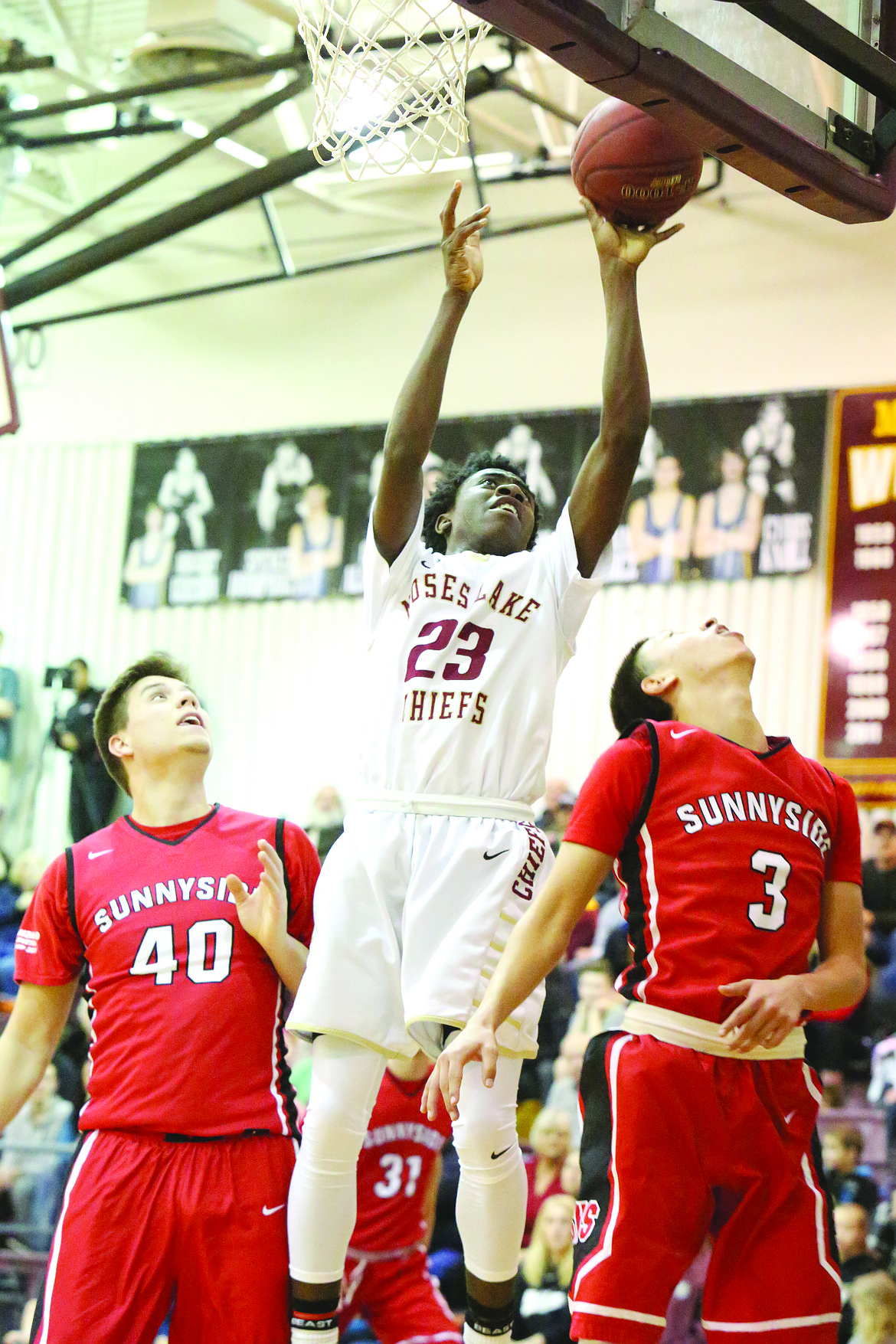 Connor Vanderweyst/Columbia Basin Herald
Moses Lake forward Gio Walker (23) scores against Sunnyside.