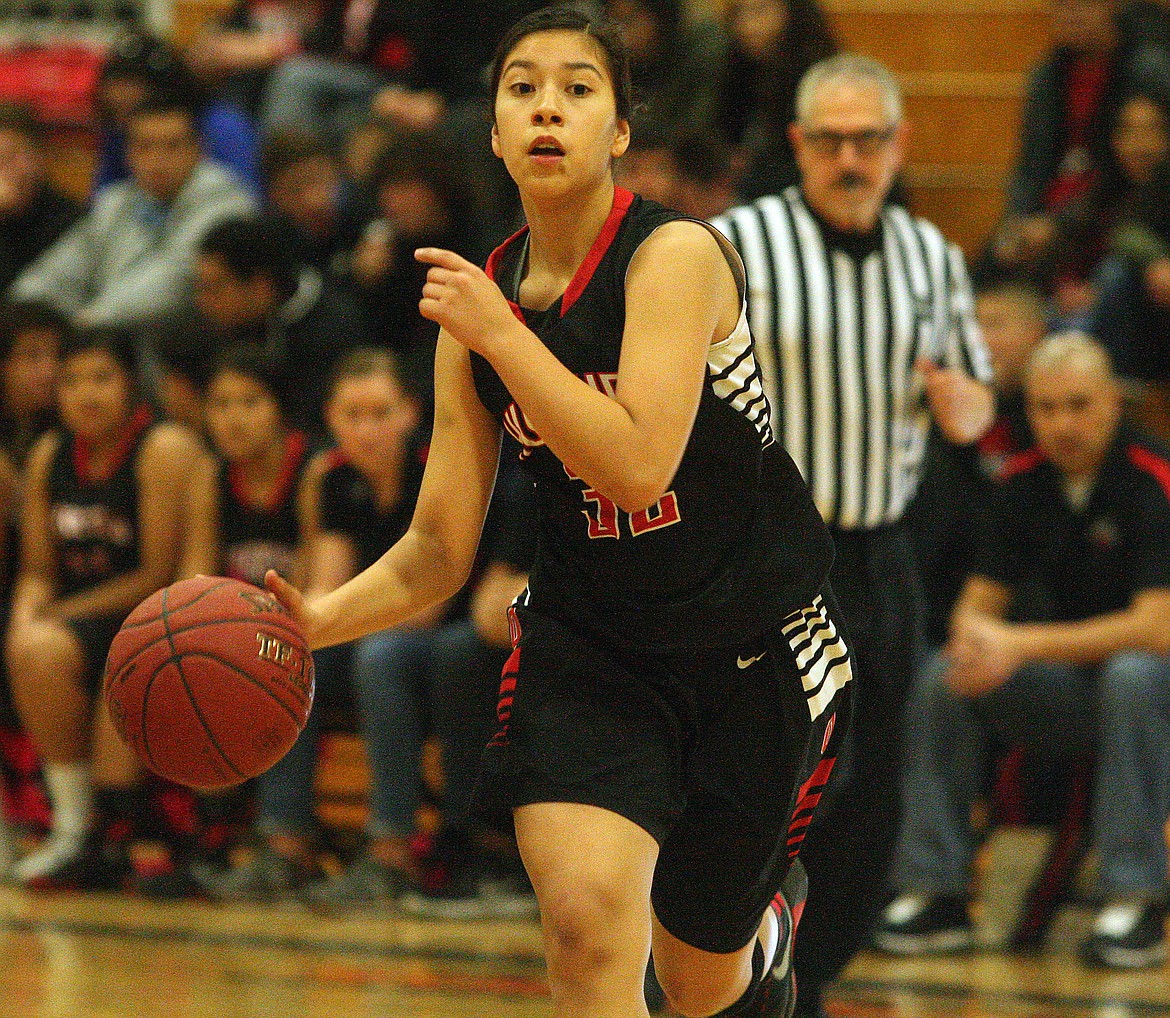 Rodney Harwood/Columbia Basin Herald
Othello sophomore Giselle Monroy pushes the ball up the floor during Saturday night&#146;s Central Washington Athletic Conference game against Ephrata. Monroy is one of six sophomores on the Huskies team.