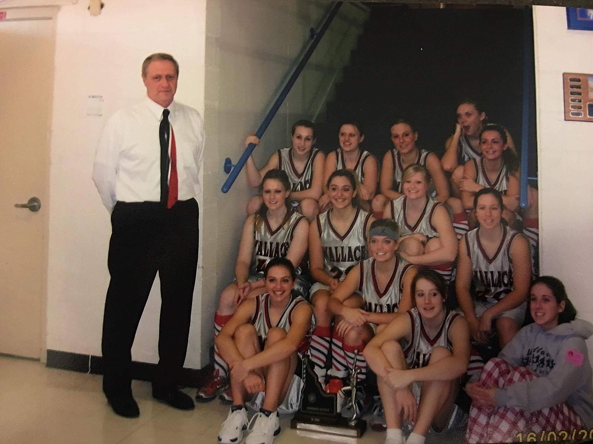 Courtesy photo
Coach Kirby Krulitz stands with the 06-07 Wallace Miners consolation championship team.