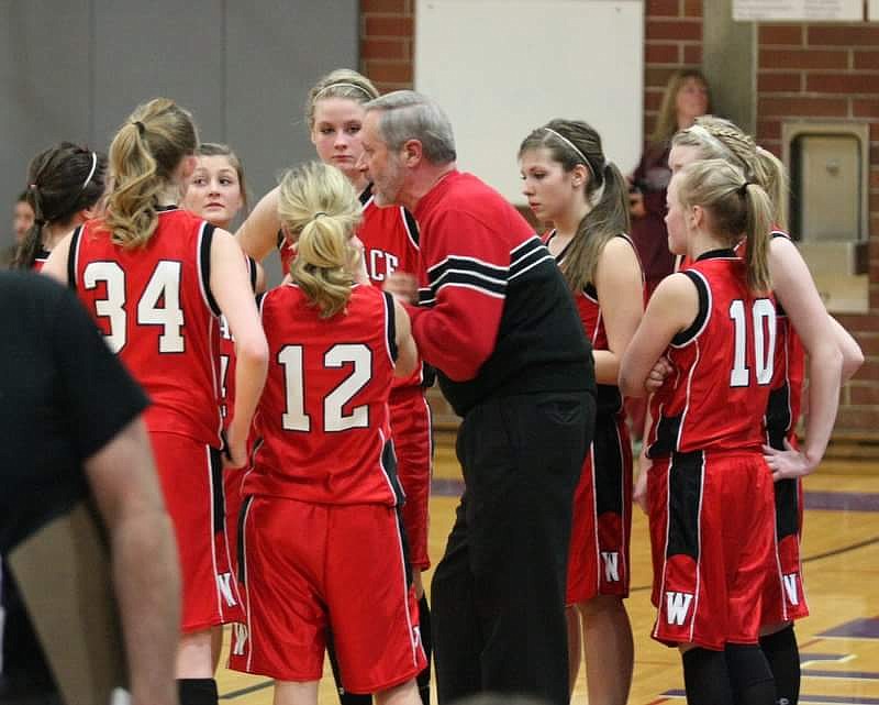 Courtesy photo
Kirby gets his girls fired up during a game in 2010.