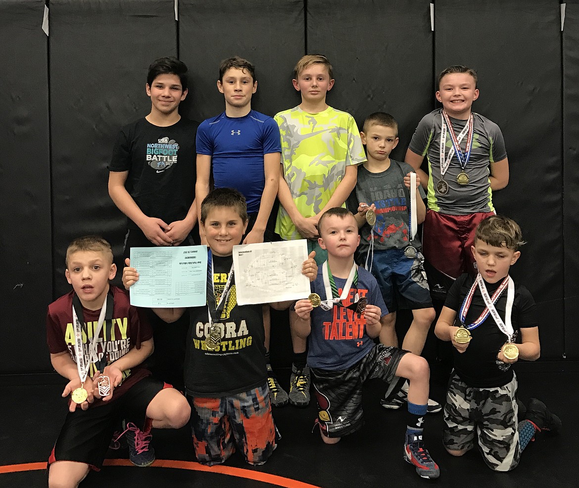 Courtesy photo
After the Deer Park event, several Team Real Life members traveled to Missoula, Mont., for the Grapple in the Garden tournament on Jan. 29. In the front row from right are Damian Hamilton, 3rd; Colton Austin, 1st; Sawyer Sage, 3rd and Matthew Hamilton, 1st; and back row from right, Isaac Jessen, 1st; Alex Austin, 3rd; Walker Rouse, 6th; Rider Seguine, 2nd and Kendall Sage, 1st and 4th. Not pictured is Gavin Rodriguez, 4th.