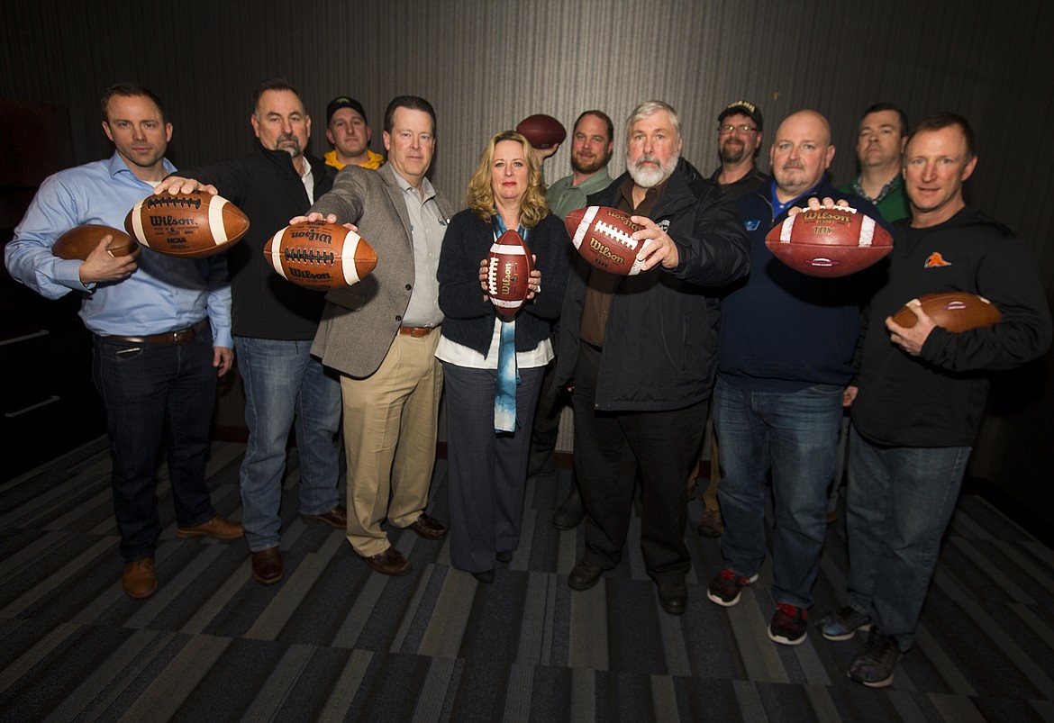 LISA JAMES/PressAll season long, a dozen local celebrities picked winners for every NFL game for the 2016-17 Coeur d&#146;Alene Press All-Star Pigskin Prognosticators competition. From left to right: Duffy Smock, Rob Smith, Tim Kiefer, Steve Griffitts, Eve Knudtsen, Mark Koerner, Vic Holmes, Jeff Runge, Jeff Conroy, Ryan Davis and Blaine Bennett. Not pictured: John Beutler of Century 21 Beutler and Associates.