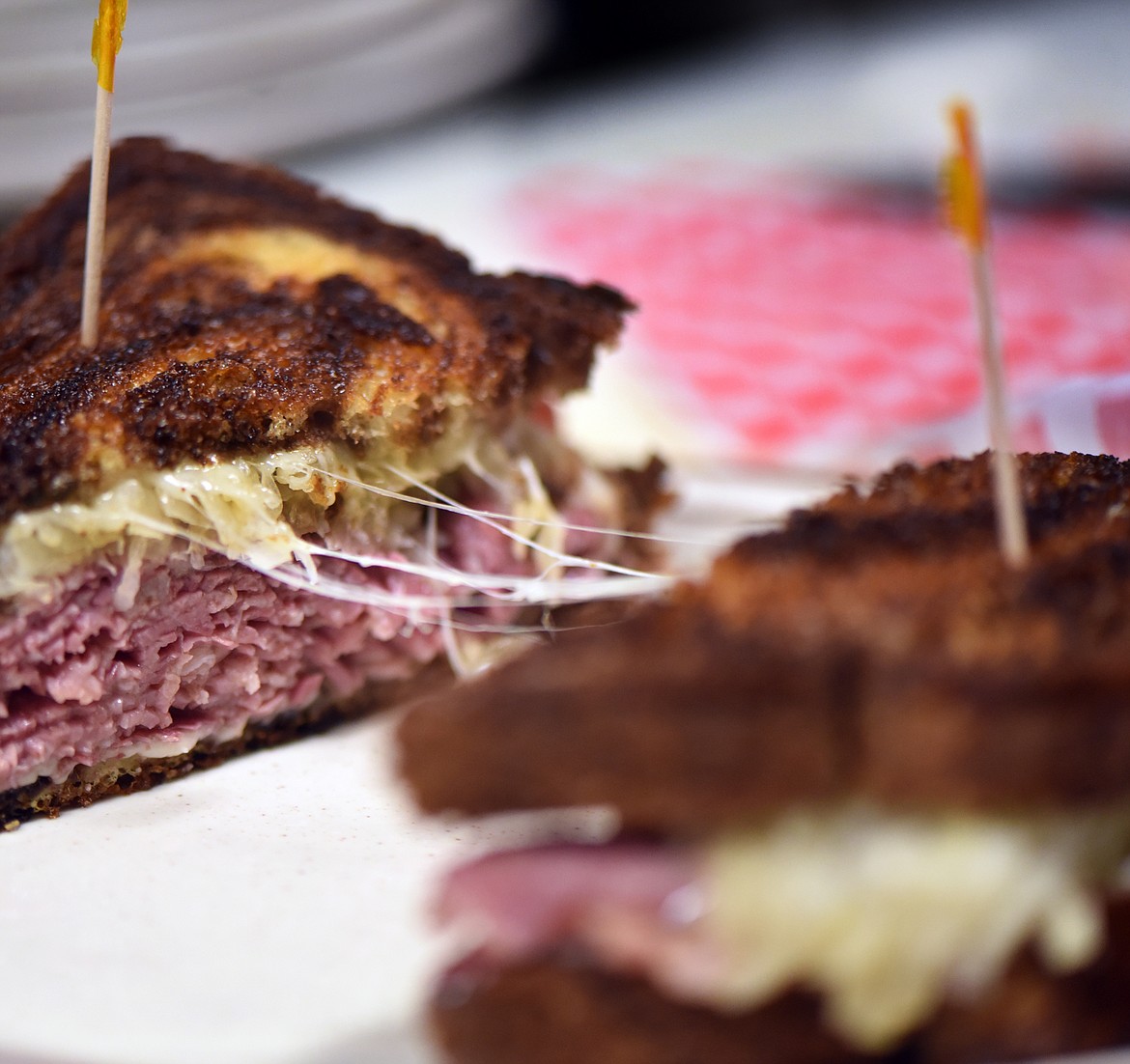 A classic Ruben cut into halves and waiting for fresh fries at Fatt Boys in Kalispell. The sandwich is made on marble rye bread with corn beef, sour kraut, Swiss cheese, and a sweet/hot mustard.(Brenda Ahearn/Daily Inter Lake)