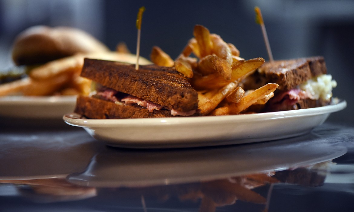 A classic Ruben plated up and ready to be served at Fatt Boys in Kalispell. The sandwich is made on marble rye bread with corn beef, sour kraut, Swiss cheese, and a sweet/hot mustard.(Brenda Ahearn/Daily Inter Lake)