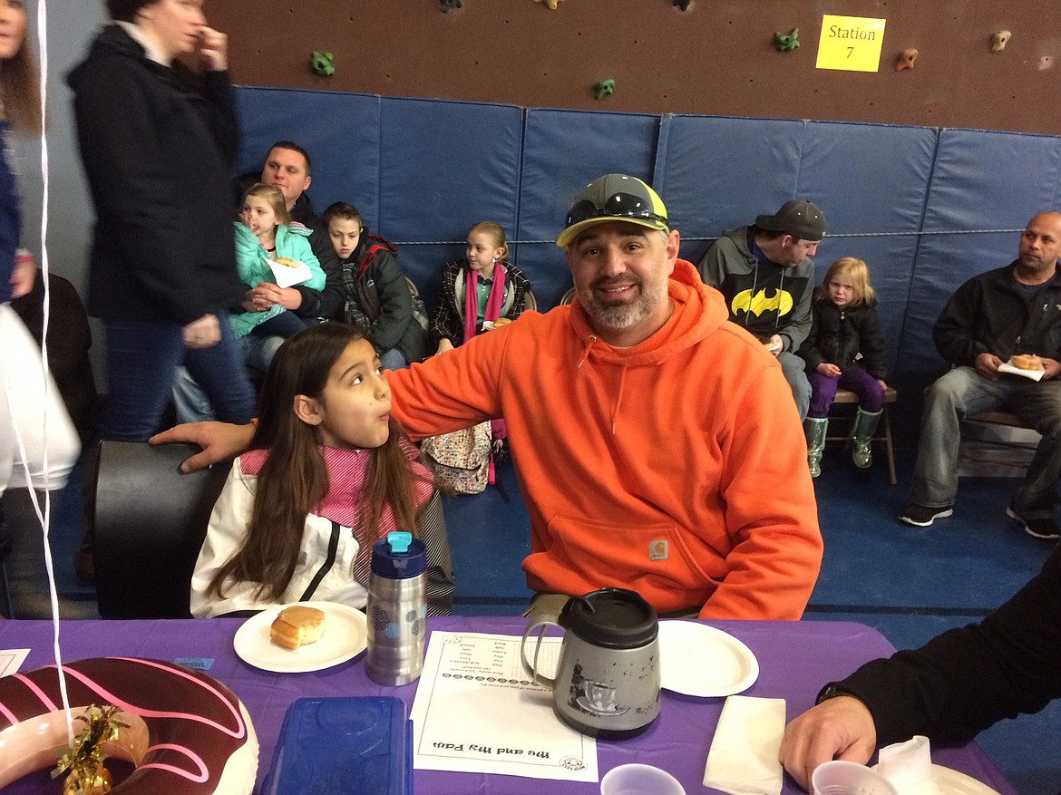 Courtesy photo
Dads (and granddads and uncles) and kids shared doughnuts and got information about the Watch Dog program during Doughnuts With Dad Thursday at Peninsula Elementary School.