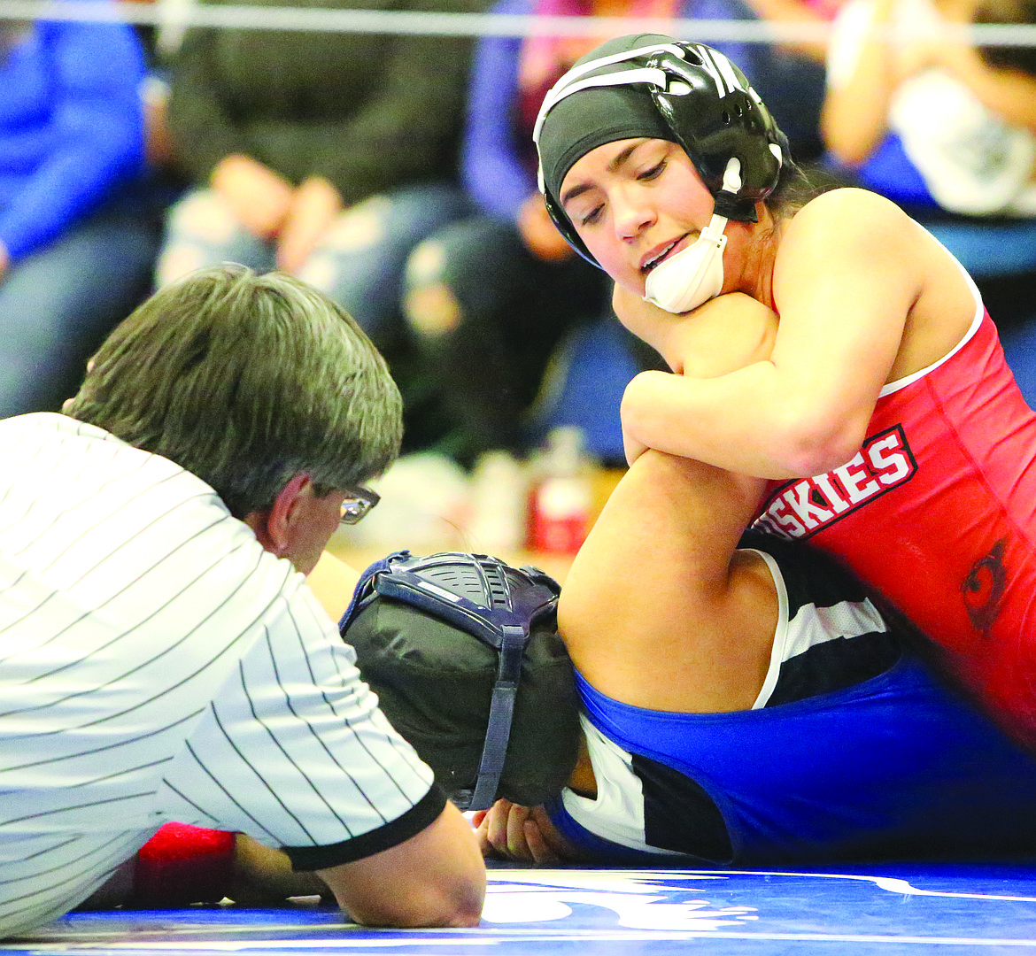 Connor Vanderweyst/Columbia Basin Herald
Othello's Nikki Velazquez (red) scores back points in the district semifinals against Maria Mondragon of Kiona-Benton.