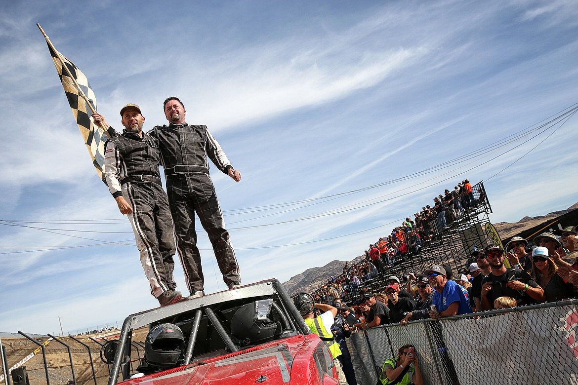 TOM MORE (left) and Marty Mann celebrate their victory at the Ultra4 National Championships in Reno, Nevada in October 2016. (Photo courtesy of Thom Kingston)