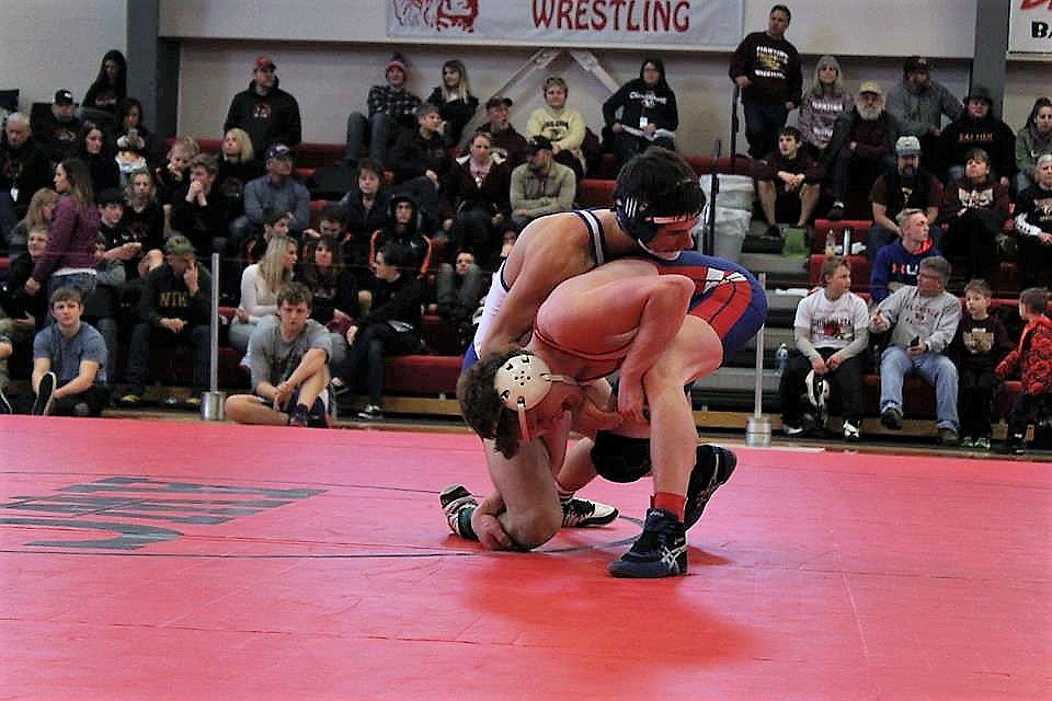Kaleb Ververis won a spot at State during Saturday&#146;s tournament in Arlee. He placed third in 132 pounds. (Photo by Taryn Ververis).