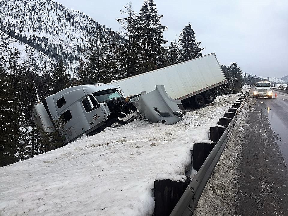 A truck jumped the guardrail west of Fish Creek on Sunday morning. Driving conditions were severe over the weekend due to snow and freezing rain. No injuries were reported. (Photo courtesy of Frenchtown Fire Department).