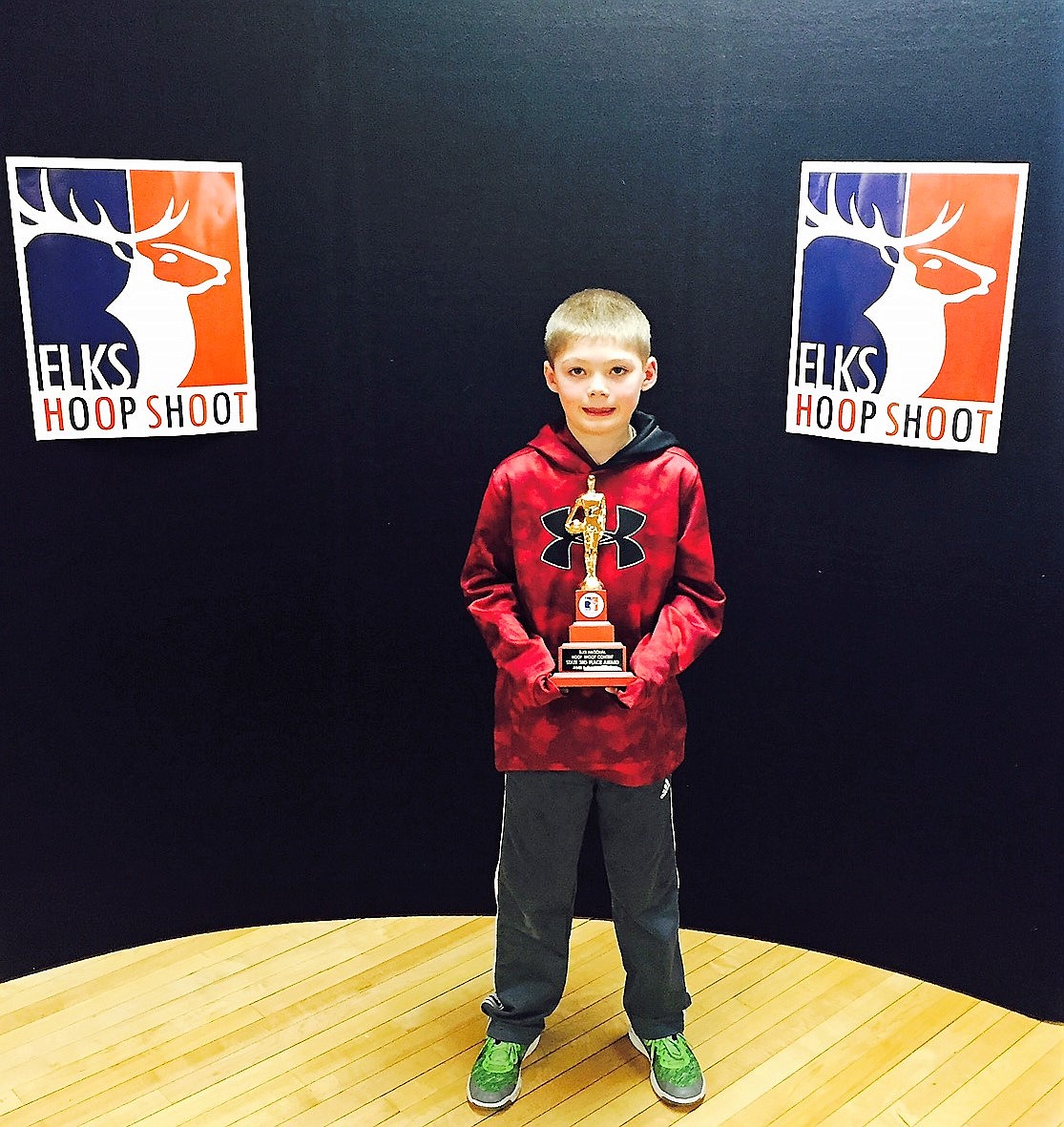 Superior School second-grader Carson Toivonen holds his third-place trophy at the Elks Hoop Shoot Championships held in Livingston on Saturday, Feb. 4. (Photo courtesy of Chris Toivonen)