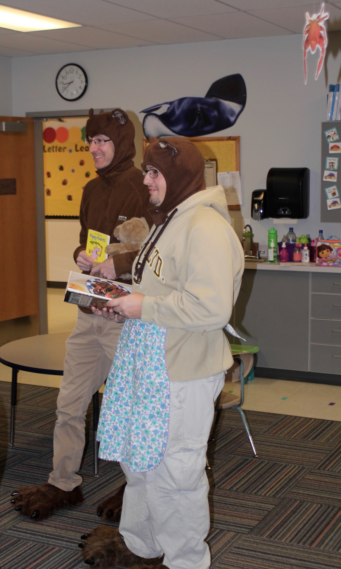 MAMA BEAR (High School Counselor Tyrell Allen) and Baby Bear (Plains High School Principal Kevin Meredith) stop by the kindergarten class.