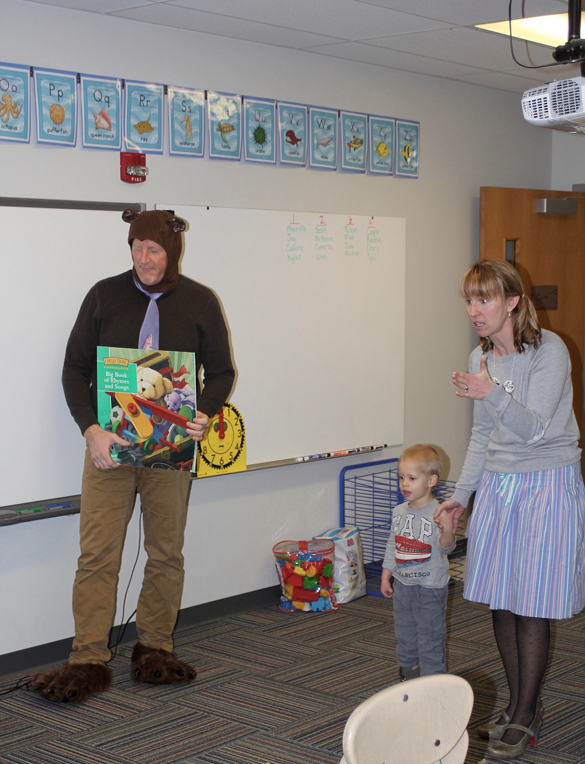 Goldilocks (Plains Elementary Counselor Molly Tingley) and Papa Bear (Plains Elementary Principal Jim Holland) stop by the kindergartners class to encourage them to read.