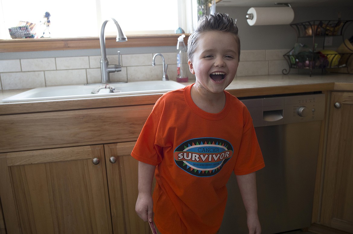 LISA JAMES/ PressTyce Fuqua plays in his Hayden home on Tuesday. After 3 years and 3 months of leukemia treatment, Tyce rang the &quot;Cancer free&quot; bell last Thursday,  his last day of treatment.