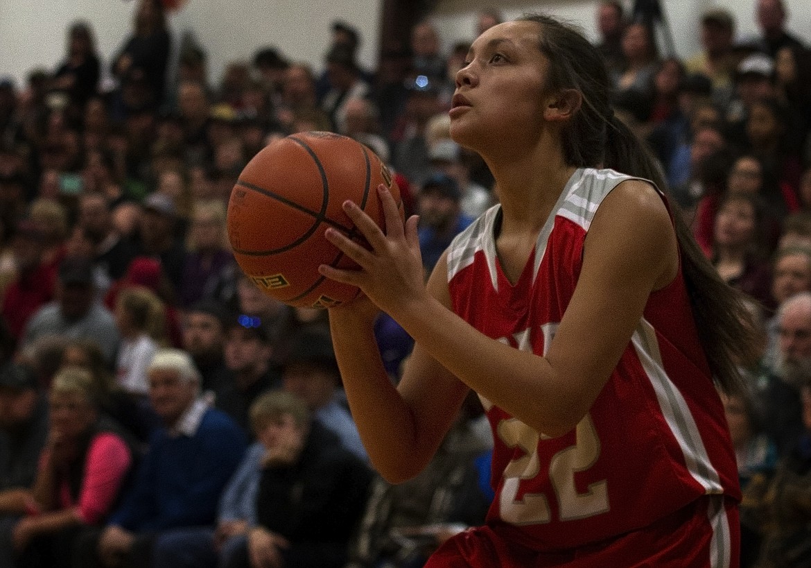 ARLEE GUARD Ashley Tanner attempts a jump shot in the first half of the Western Class-C Conference game against Plains Friday night at Plains High School. (Jason Blasco/Lake County Leader)