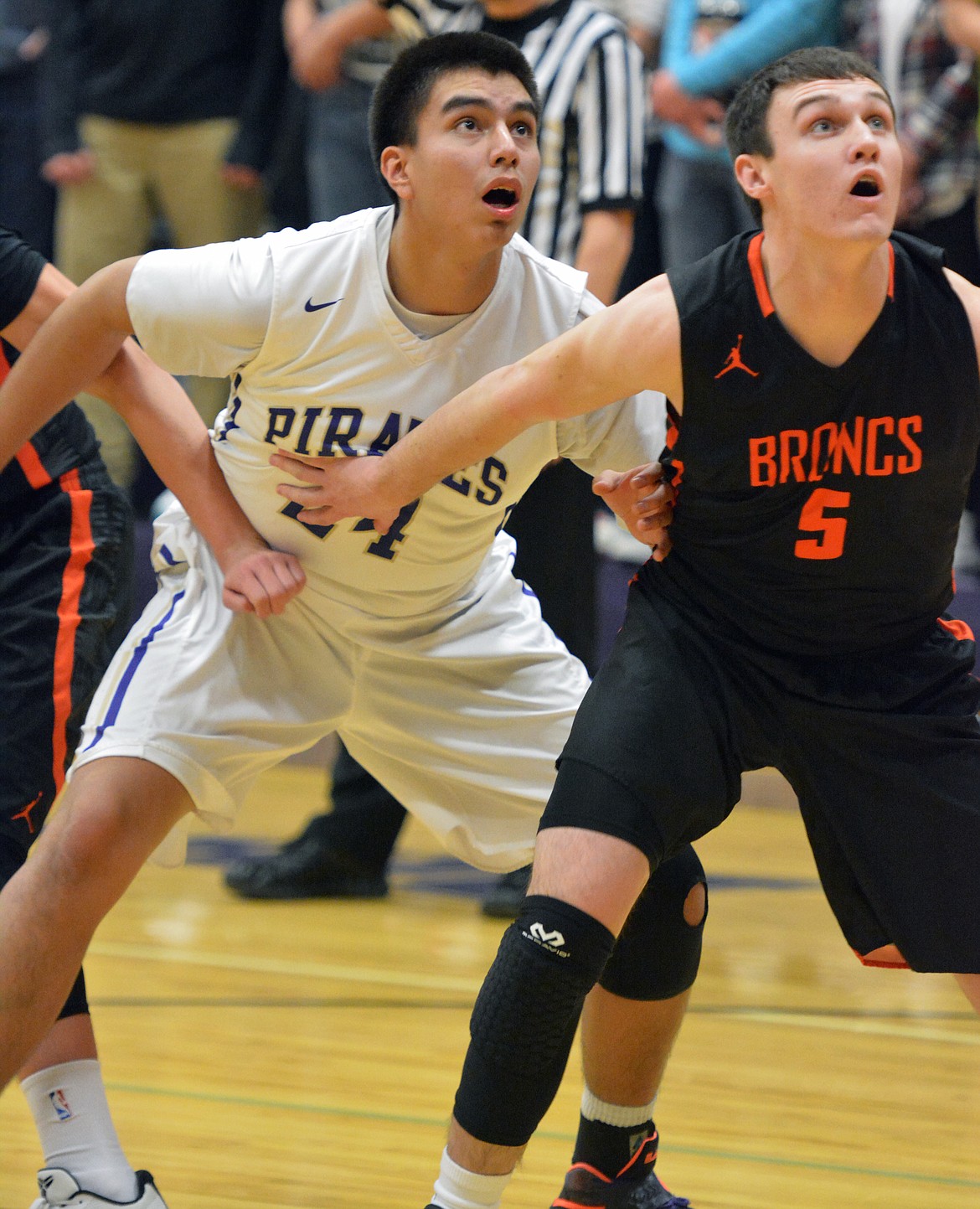 POLSON PIRATE gaurd Jaydon Bautista attempts to box out a Frenchtown defender in the fourth quarter of Friday night&#146;s game at Linderman Gym. (Jason Blasco/Lake County Leader)