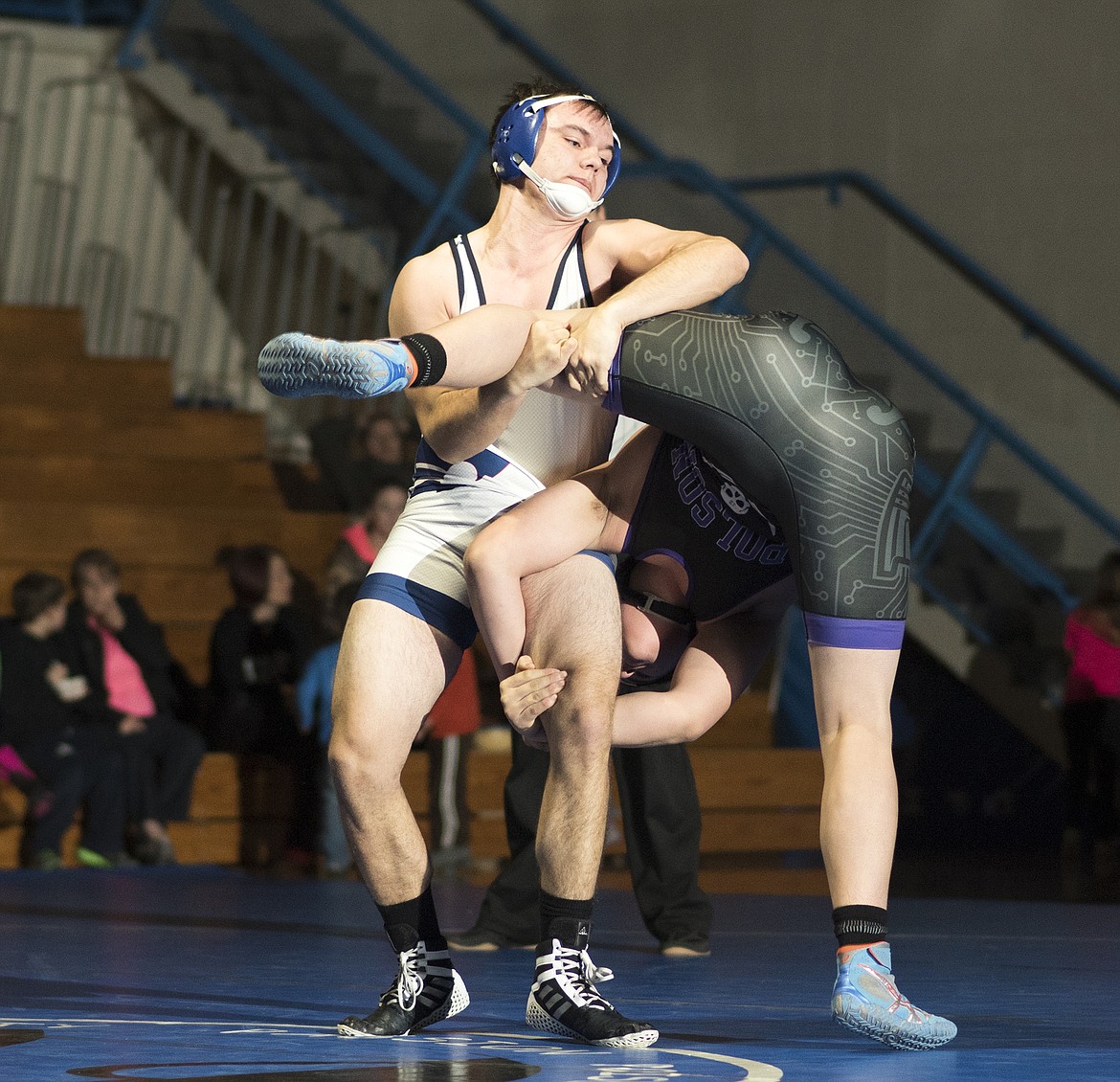 Columbia Falls&#146; Jakob Freeman takes down Noah Humphrey of Polson in dual action in Columbia Falls Thursday. (Chris Peterson photo)