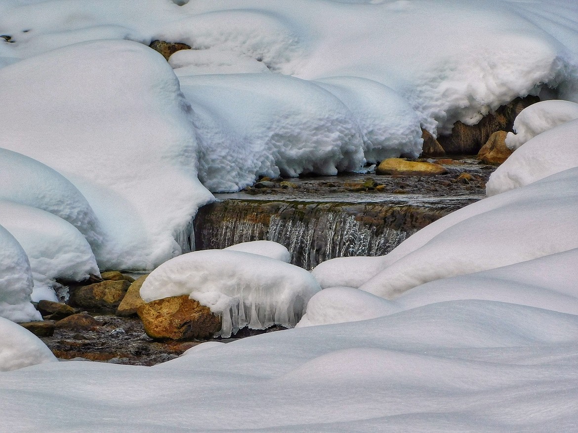 Ice and snow frost the features of Ninemile Creek, just north of Wallace.