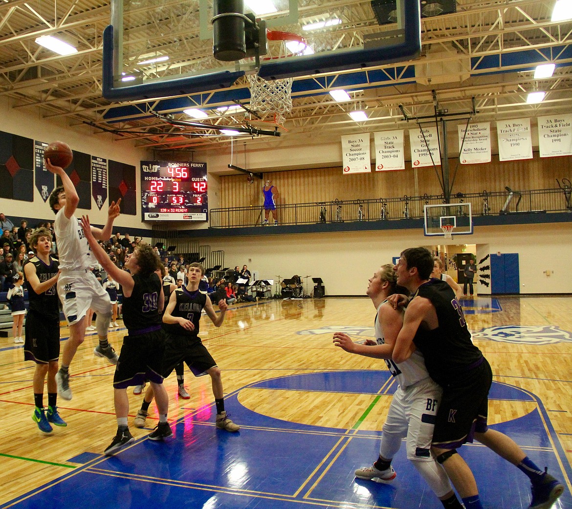 &#151;Photos by DAC COLLINS
The Bonners Ferry boys varsity basketball team&#146;s slump continued last week as they dropped two more games, one to Priest River and the other to Stillwater Christian, on Jan. 27 and 28. Caleb Harrington led the Badgers in scoring in the Priest River game on Jan. 27 with 17 points, followed by Chris Sabin with 9 and Kaleb Stockton with 8. While Bonners Ferry kept the game close and gave the visiting team a run for their money, the Spartans ended strong and won the game 54-51. The Badgers lost the following night&#146;s game to Stillwater Christian (60-67), bringing the team&#146;s overall record to 3-8. The Badgers are currently 0-2 in league and they will play their next league game against Timberlake at home on Thursday, Feb. 2.