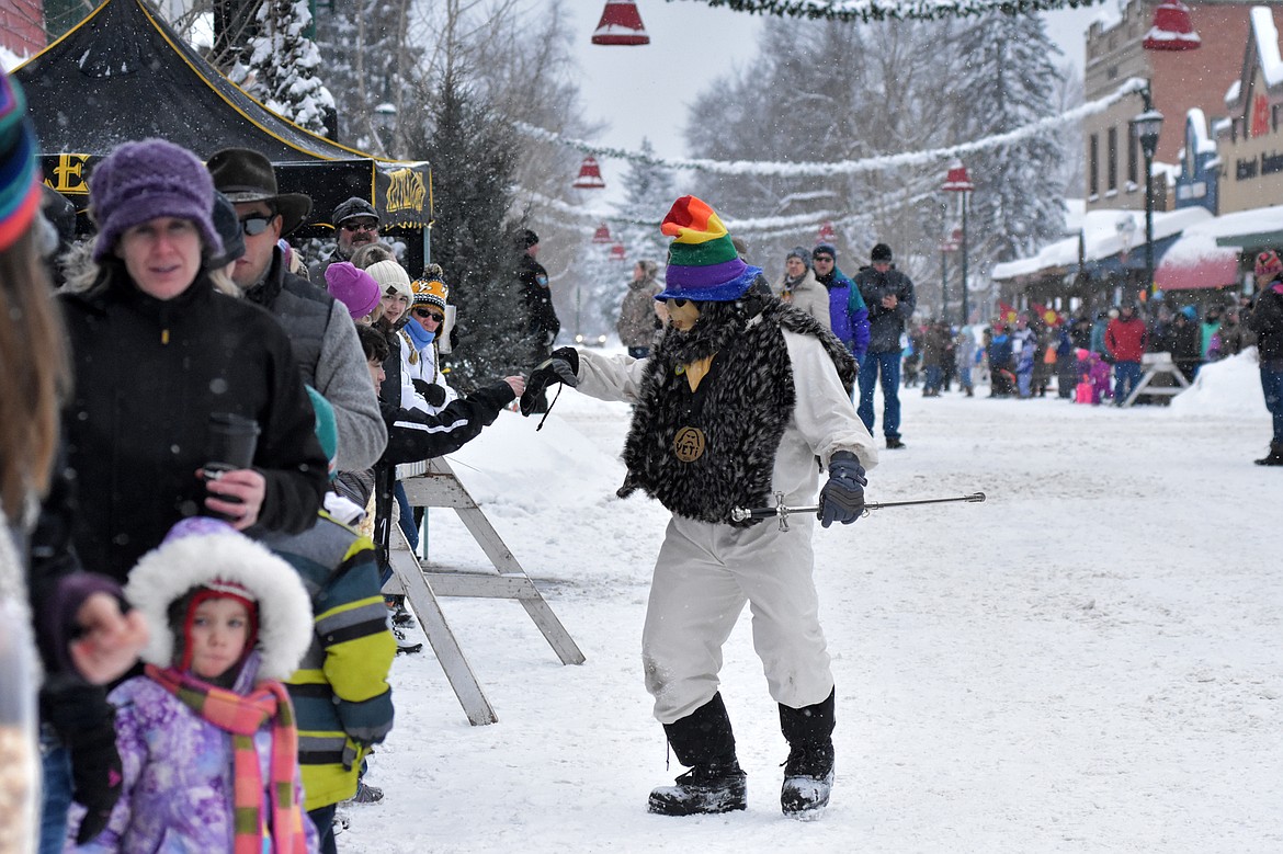 A Yeti works the crowd Saturday before the start of the 58th annual Whitefish Winter Carnival Grand Parade. This year&#146;s theme was &#147;One Fish, Two Fish, Whitefish&#148; a nod to the many colorful Dr. Seuss children books. (Heidi Desch/Whitefish Pilot)