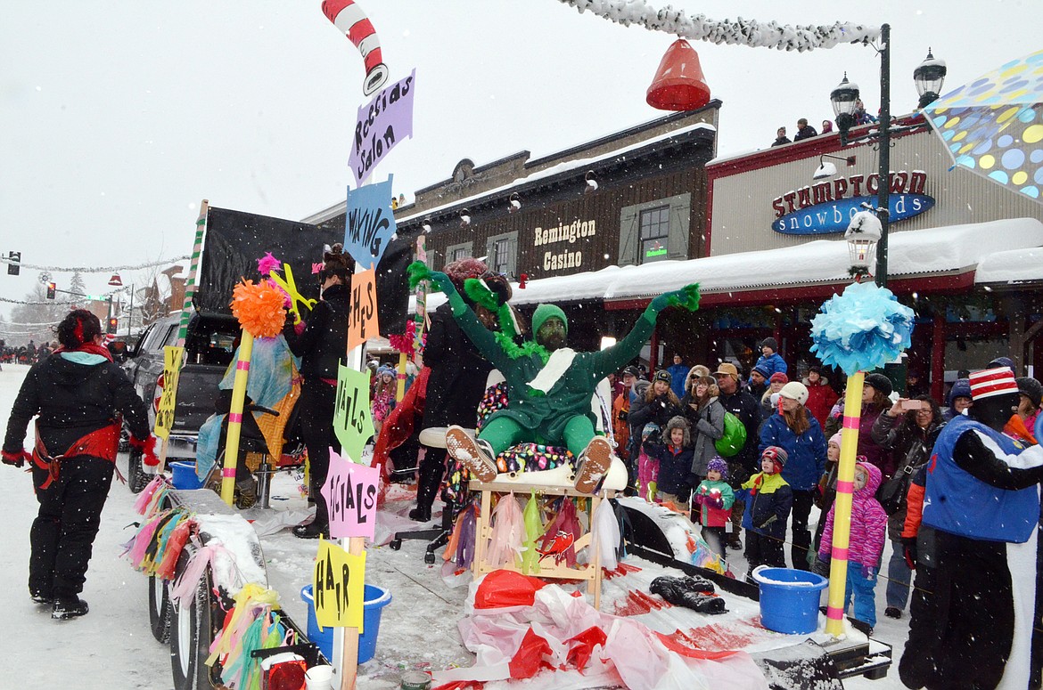 The Grinch rides on the Reecia&#146;s Salon float Saturday during the 58th annual Whitefish Winter Carnival Grand Parade. This year&#146;s theme was &#147;One Fish, Two Fish, Whitefish&#148; a nod to the many colorful Dr. Seuss children books. (Heidi Desch/Whitefish Pilot)