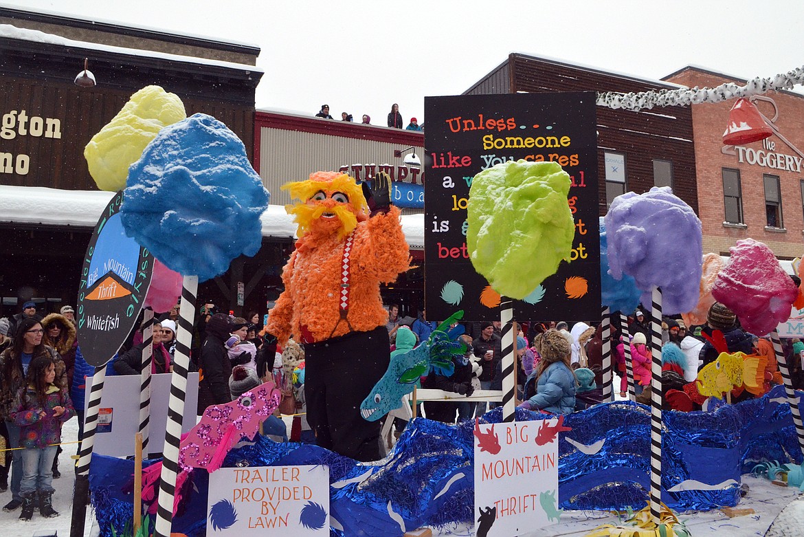 The Big Mountain Thrift float took on the theme of Dr. Seuss&#146; book &#147;The Lorax&#148; Saturday for the 58th annual Whitefish Winter Carnival Grand Parade. This year&#146;s theme was &#147;One Fish, Two Fish, Whitefish&#148; a nod to the many colorful Dr. Seuss children books. (Heidi Desch/Whitefish Pilot)