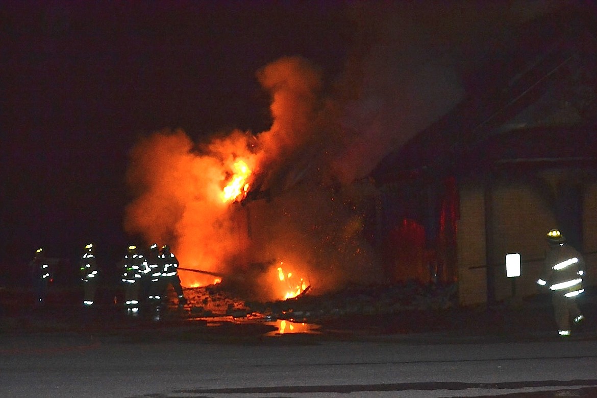 &#151;Photo by SARAH JENKINS
Firefighters try to contain a fire at St. Ann&#146;s Catholic Church in Bonners Ferry during the early morning hours of Thurday, April 21, 2016. The 60-year-old, historic church was destroyed in what authorities say is arson.