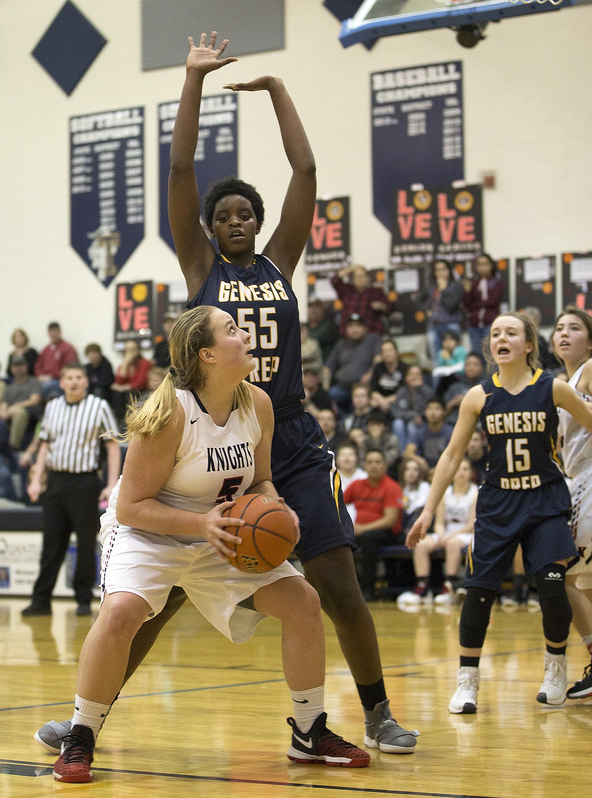 LISA JAMES/Press
Bella Murekatete (55) of Genesis Prep tries to block as Lillian Rhea of Lakeside shoots during their 1A Division II District 1 girls basketball championship game at Timberlake High School on Feb. 9. Both teams open the state tournament later today at Nampa High.