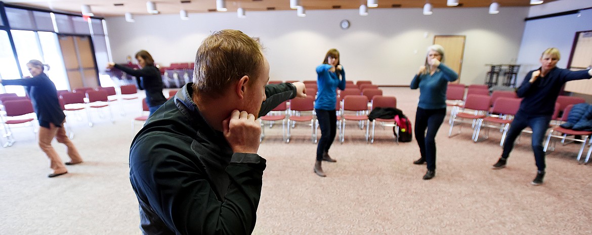 Garret Garrels leads an abbreviated Pink Gloves Boxing training at Flathead Valley Community College on Friday, February 3.&#160;(Brenda Ahearn/Daily Inter Lake)