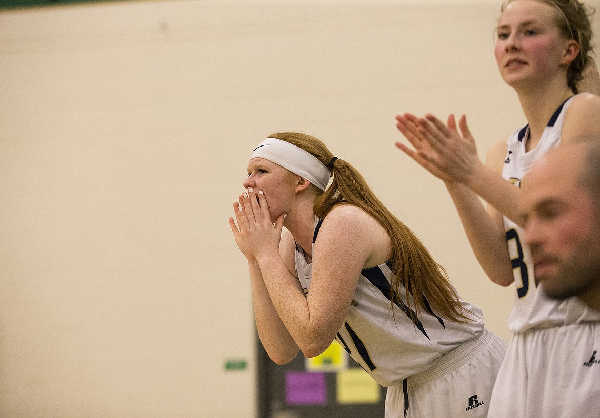 LOREN BENOIT/PressGlori Cheevers cheers for her fellow teammates during the 3A District 1 Championship game last Friday at Lakeland High School.