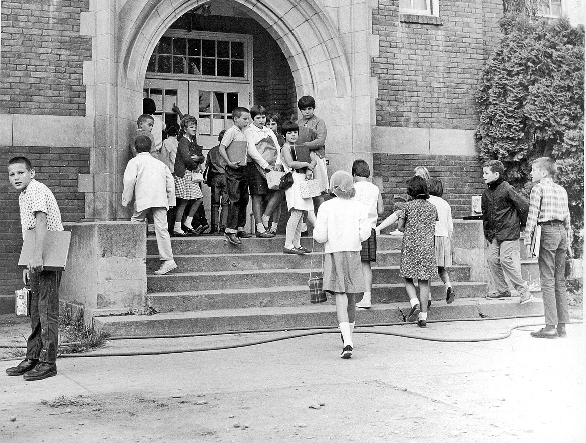 Eager youngsters crowd in front of the door at Lincoln Elementary School Tuesday morning waiting for the 1967-1968 term to begin. Photo from the Sept. 7, 1967, files of The Western News.