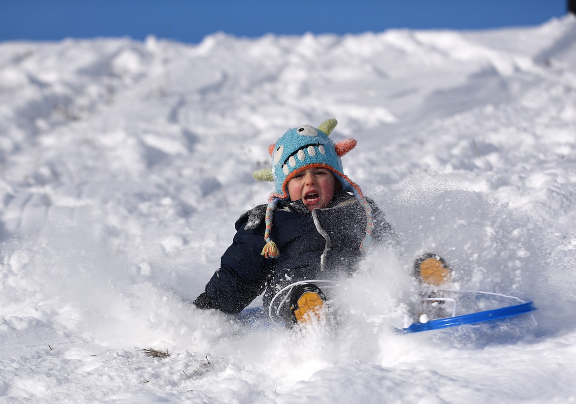 A YOUNG sledder hits a bump at Dry Bridge Park in December. (Aaric Bryan/Daily Inter Lake)