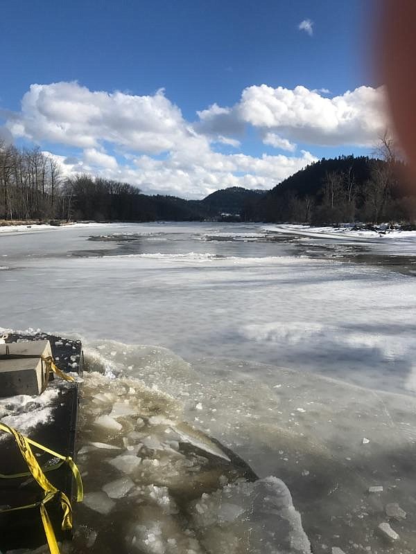 A North Idaho Maritime tugboat makes its way upstream on the St. Joe River near St. Maries on Saturday. The tug is continuing to break the ice on the river to reduce the possibility of flooding.