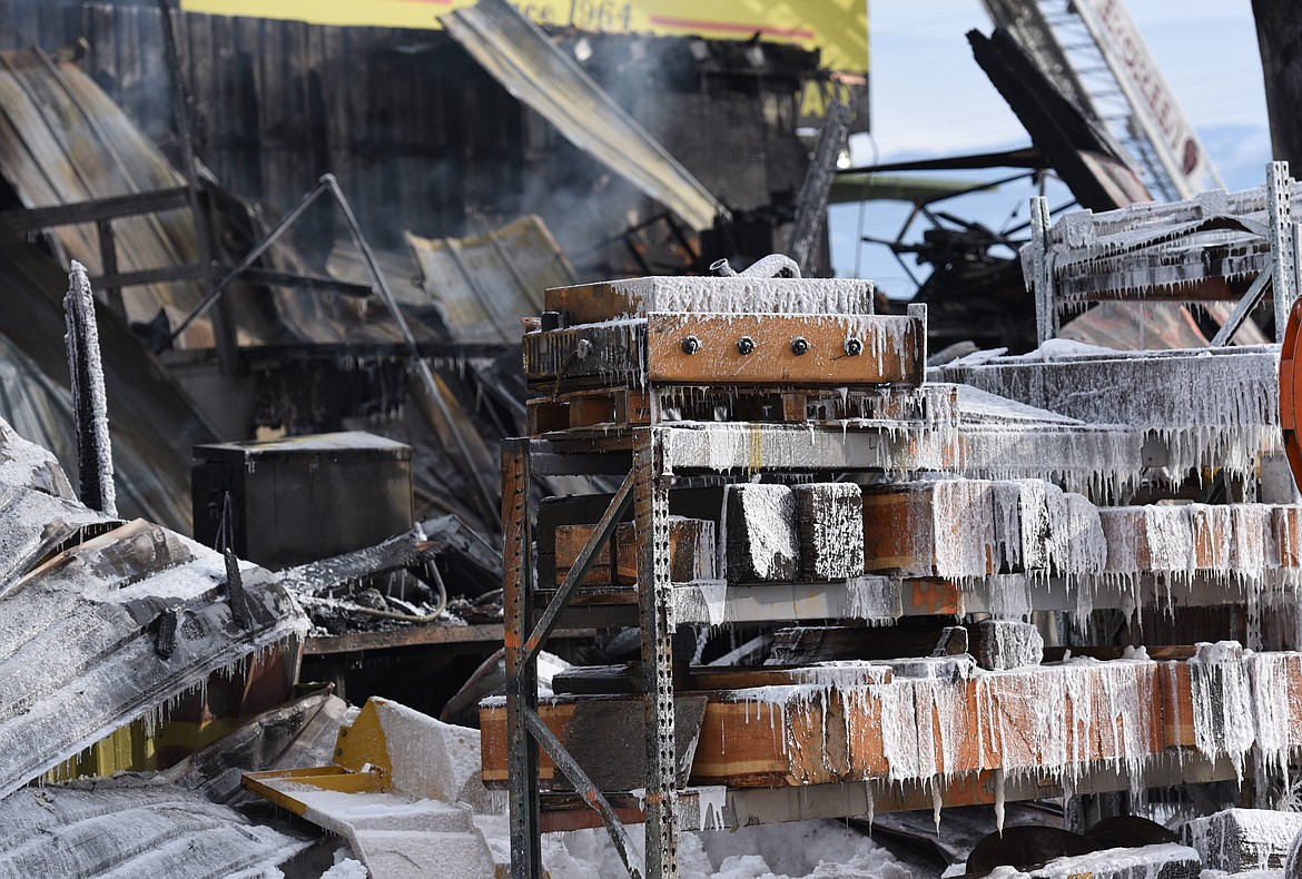 Ice forms on the shelves after the fire at Reddig Equipment and Rental in Evergreen on Wednesday. (Aaric Bryan/Daily Inter Lake)