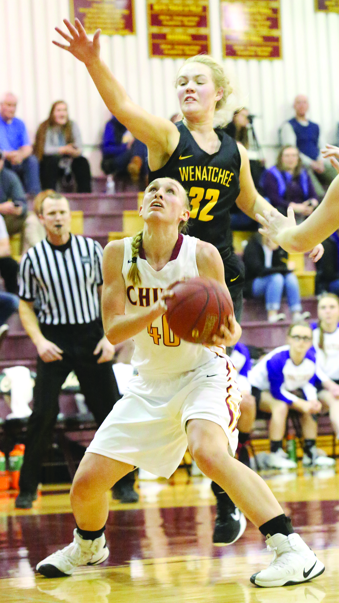 Connor Vanderweyst/Columbia Basin Herald - Moses Lake's Abby Rathbun (40) tries to avoid a block attempt by Wenatchee's Alli Hallberg.