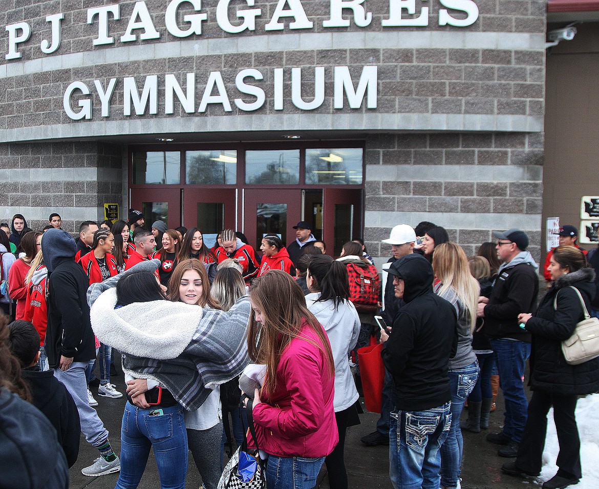 Rodney Harwood/Columbia Basin Herald - Friends and supporters of Othello wrestling gathered on Thursday morning to send the boys and girls off to the Mat Classic XXIX in style. An estimated 100 people were on hand.