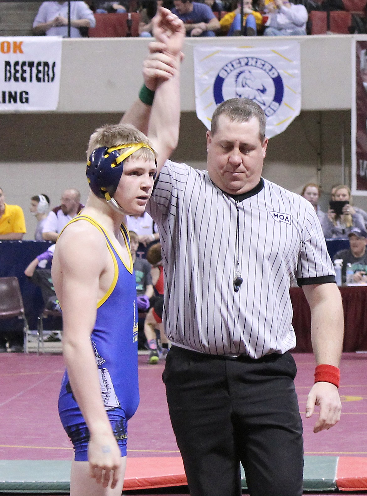 Freshman Dylan Yeadon competing at the state wrestling tournament Friday at Rimrock Auto Arena in Billings.