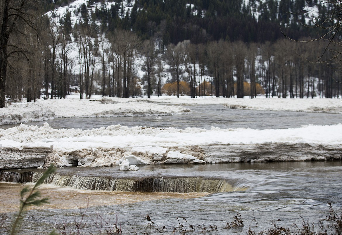 LOREN BENOIT/Press
With melting snow and rising temperatures, the St. Joe River creates a small waterfall downstream from the town of Calder east of St. Maries Friday morning.