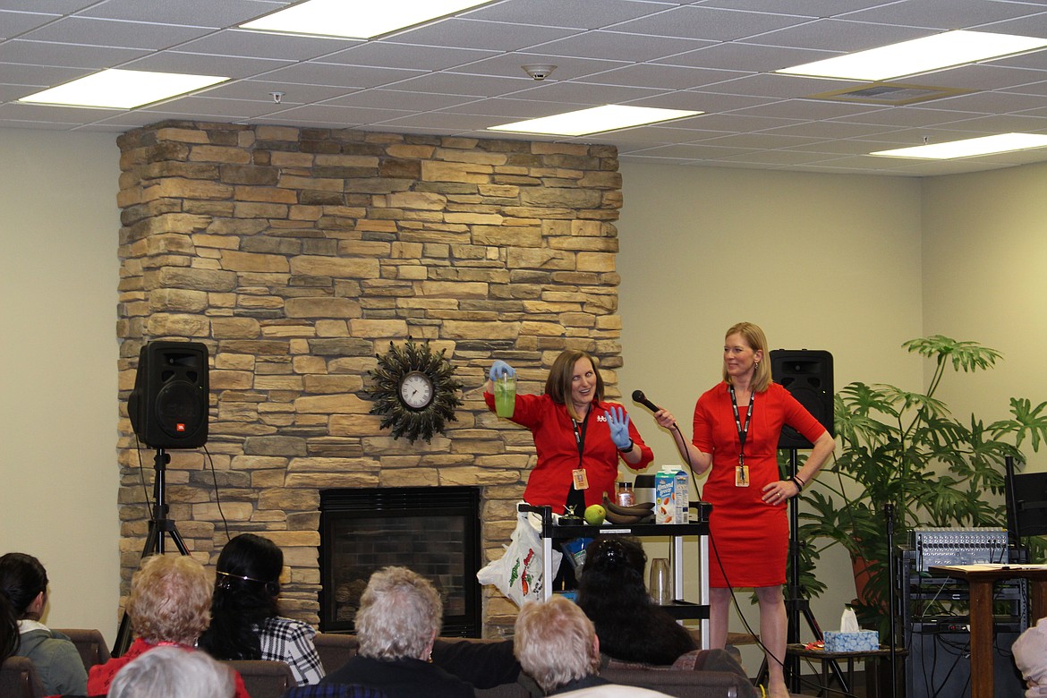 Chanet Stevenson/The Sun Tribune - Nutritionist Karlee Kerr gives a demonstration on how to make a heart healthy smoothie at the CBHA's Women's Health Expo.