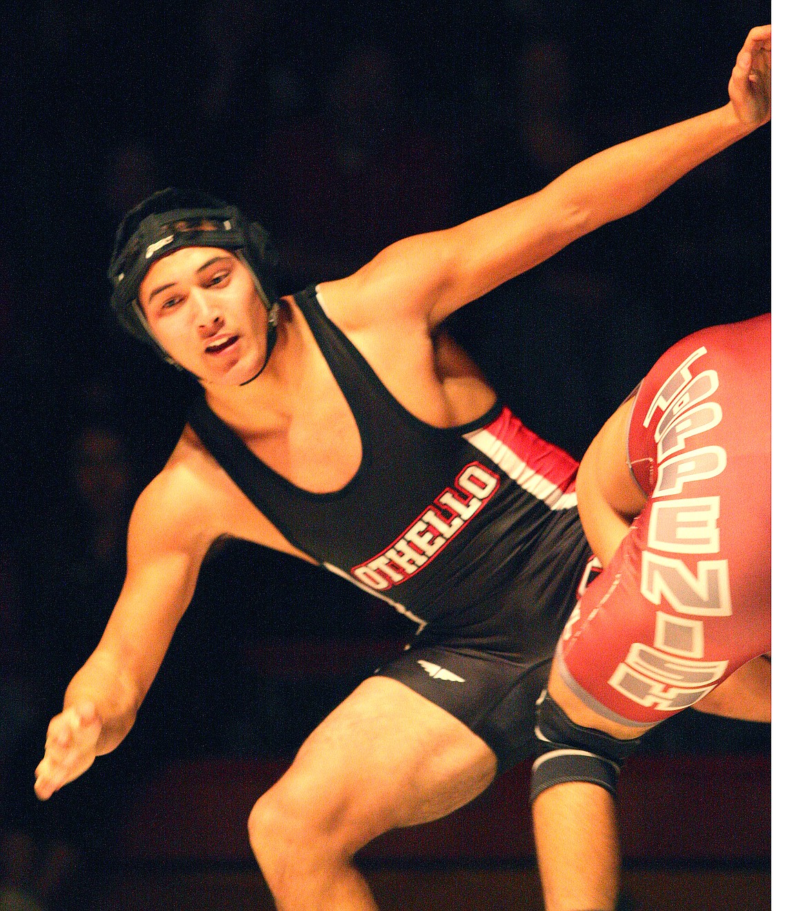 Rodney Harwood/Columbia Basin Herald - Othello 170-pounder Reese Jones works during his match against earlier in the season.