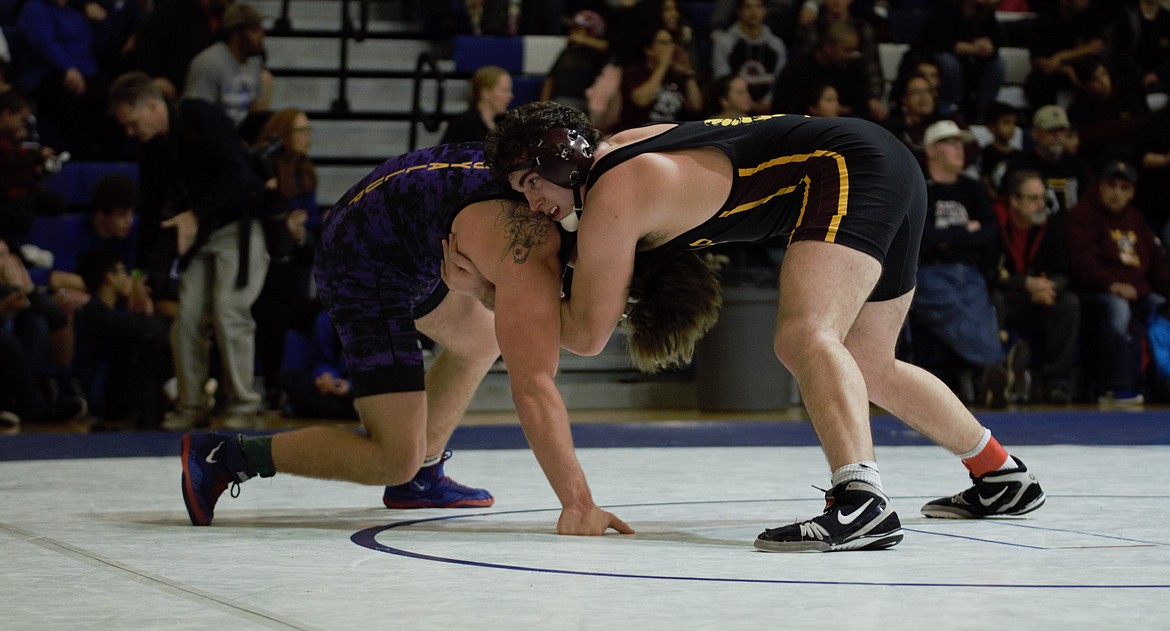 Kennady Schlagel/courtesy photo
Moses Lake's Daiman Vasquez (left) wrestles during the 4A regional at Curtis High School.