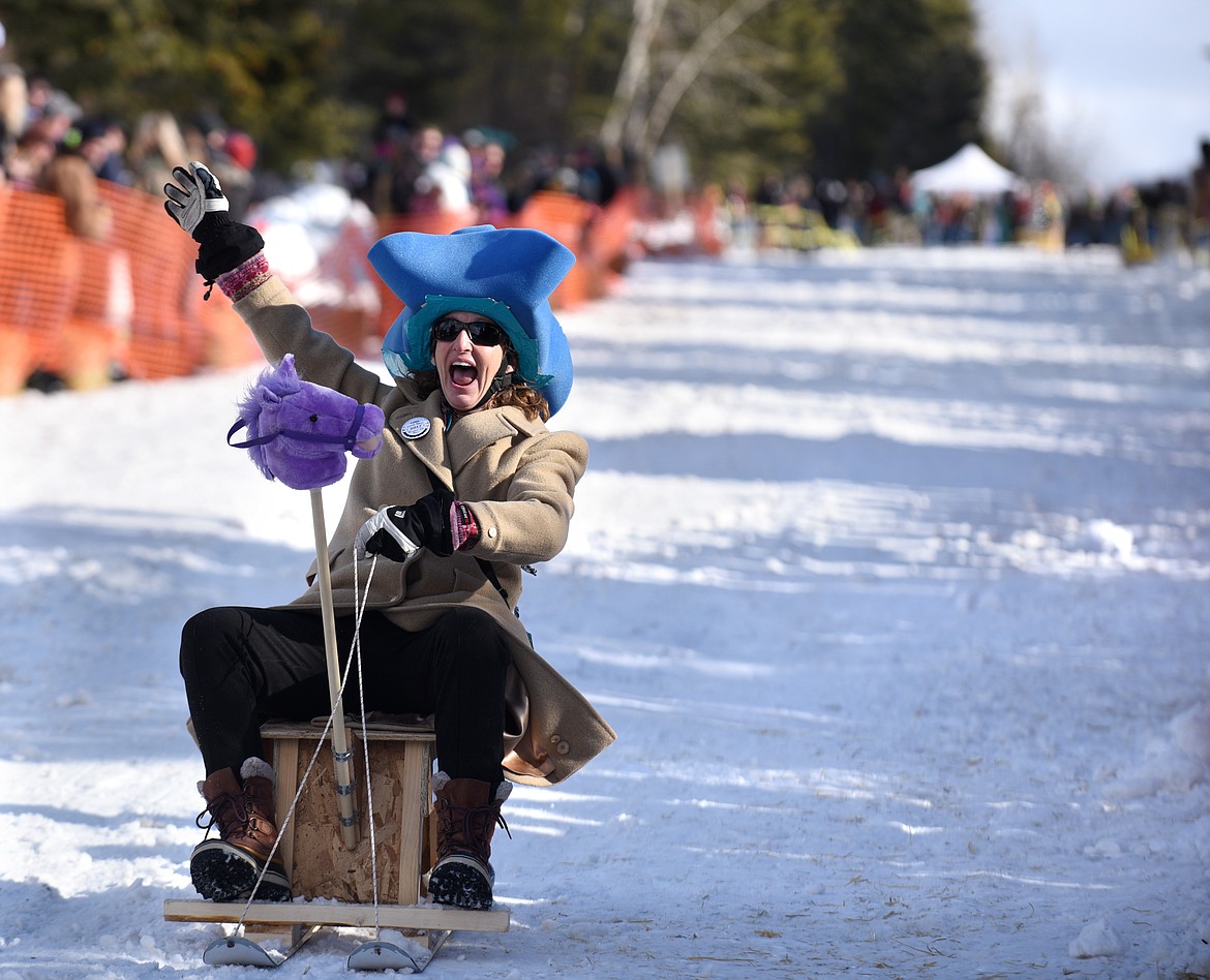 A COMPETITOR screams as she nears the finish line.