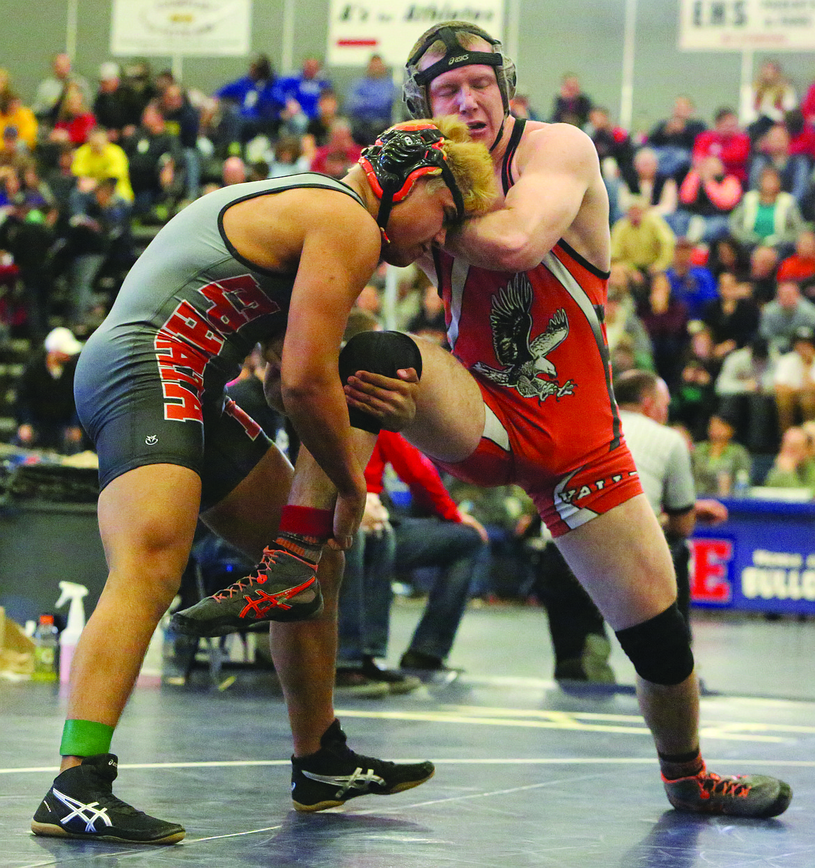 Connor Vanderweyst/Columbia Basin Herald
Ephrata's Cole Spencer grabs the leg of West Valley's Quintin Stansbury.