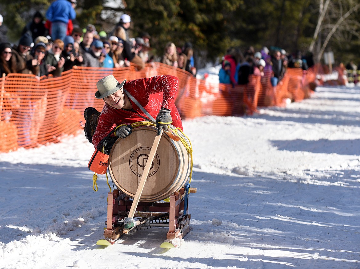 GLACIER DISTILLING Company&#146;s NIcholas Lee jumps back on his barrel.