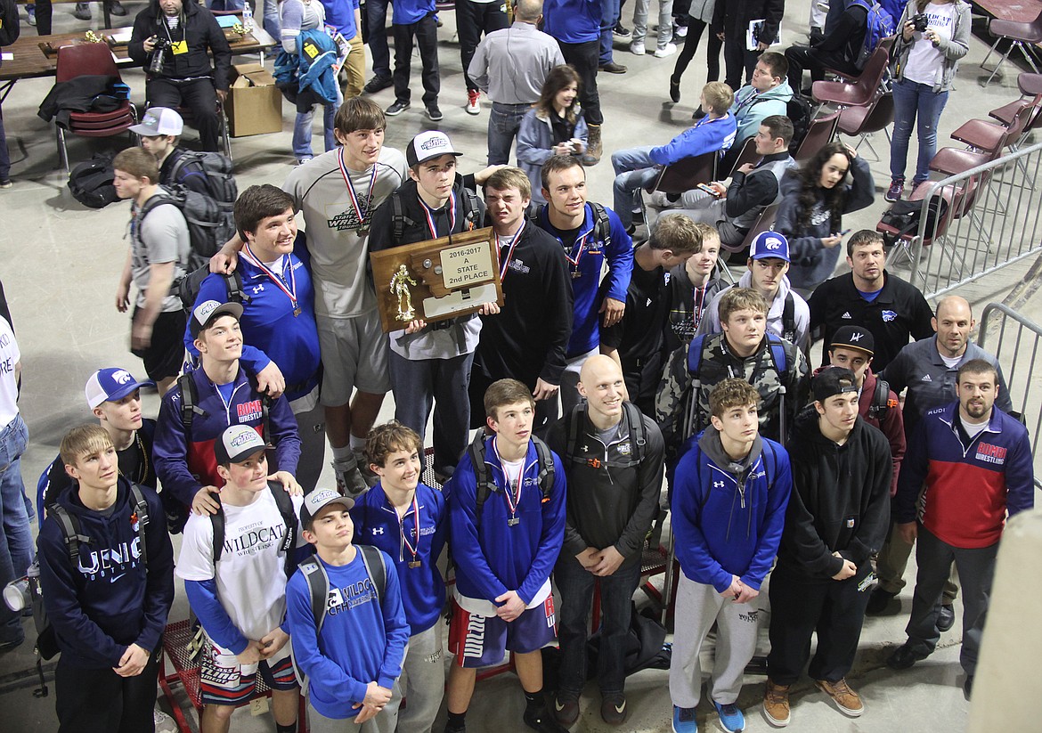 The team poses with its second-place trophy. Front row, from left, Braydon Stone, Nathan Hader, Garhet Salminen, Winfield West, Ben Windauer, Mason Fetters, Ayden Role, Taylor Gladeau, assistant coach Ben Schaeffer; back row, Shane Gee, Easton Sempf, Kyler Koski, Storm Kemppainen, Hunter Peterson, Colton McPhee, Jake Freeman, assistant coach Bryan Shaffer, Austin Nelson, Keenan O'keefe, assistant coach Rick Lawrence and head coach Jessie Schaeffer.  (Larry Wilson photo)