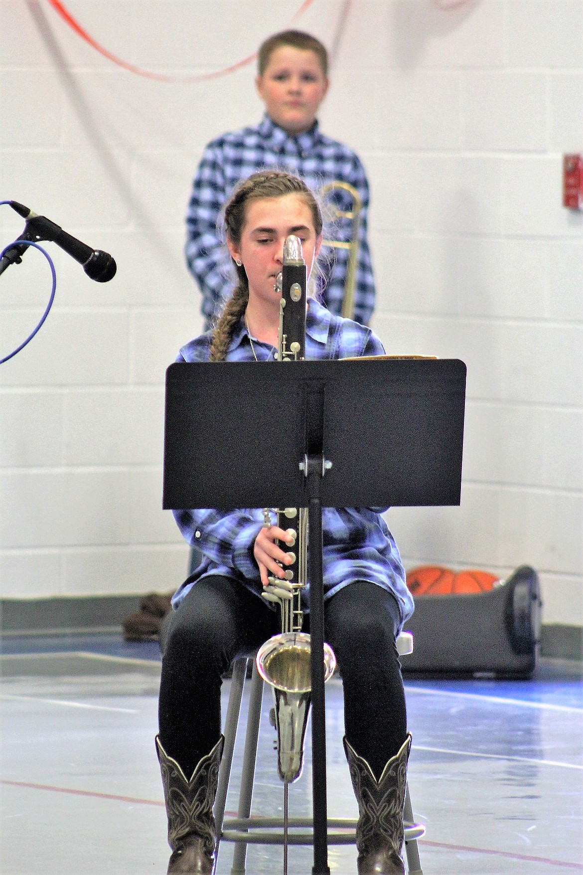 Lanie Crabb, fifth grade, plays the bass clarinet during the Friday talent show, just after Jaxson Green played the trombone.