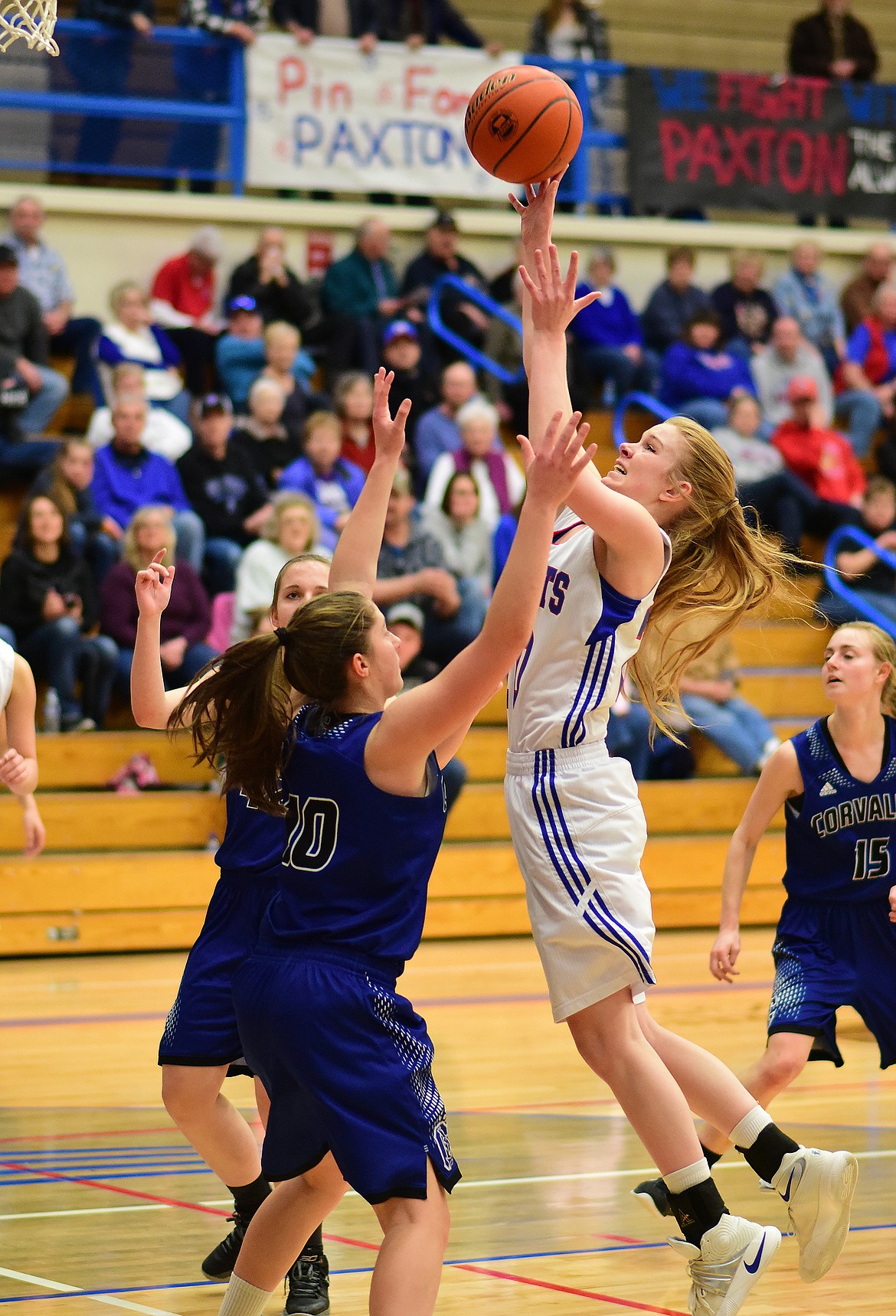 Cydney Finberg with a jumper against Corvallis.