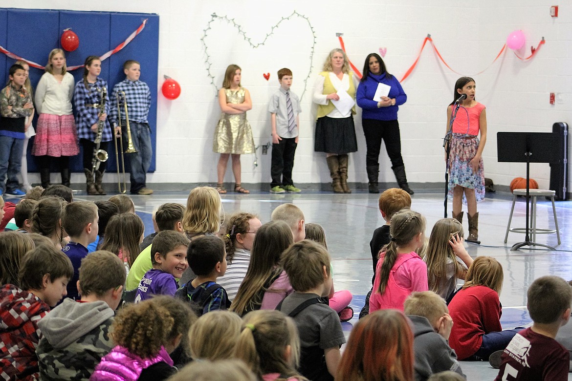 Elementary students took a seat on the gym floor as they cheered on their classmates during the Superior Talent show on Friday. Bailey Hansen entertained with the song, &#147;One Call Away.&#148;