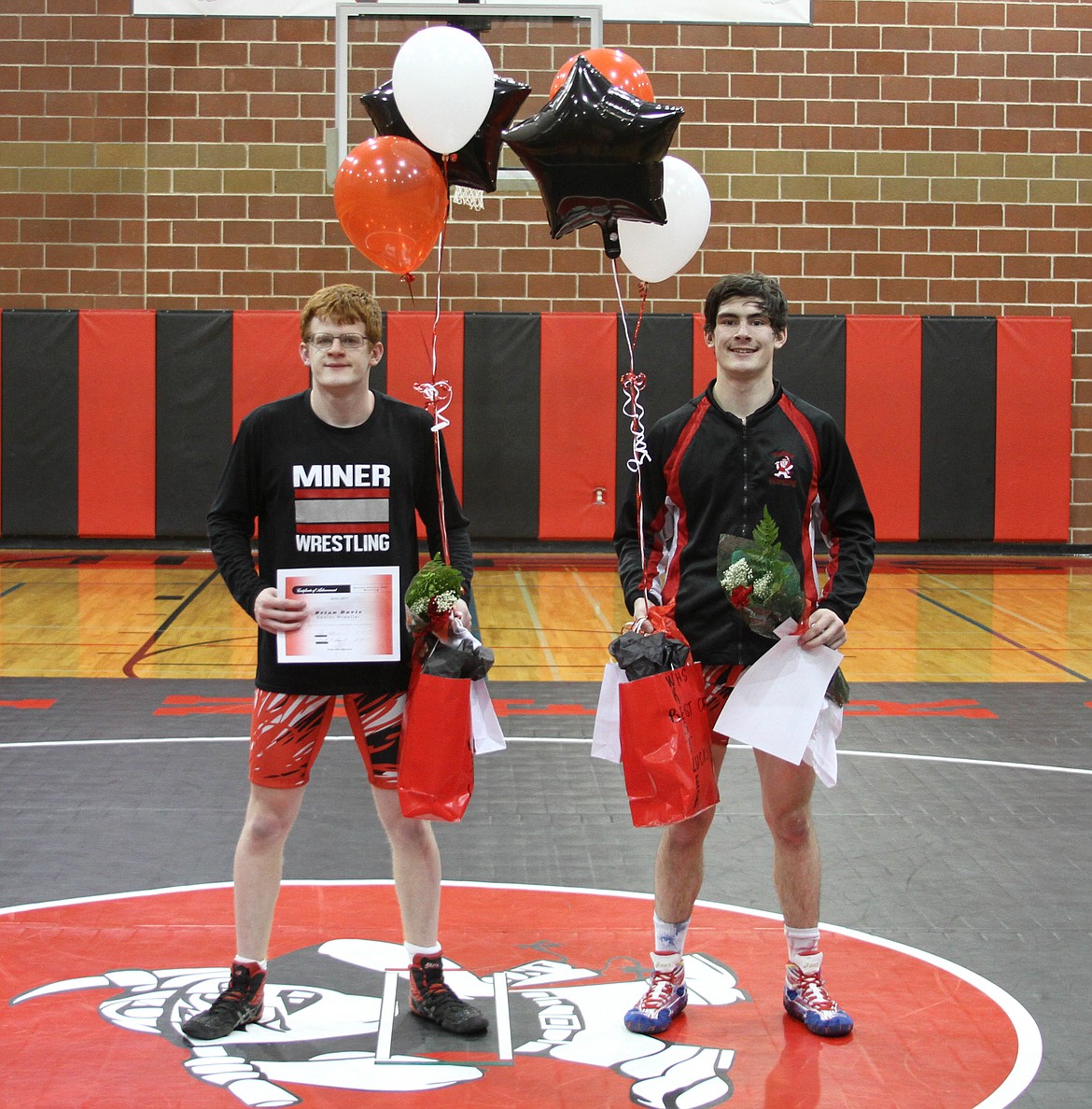 Wallace High School seniors Brian Davis and Stetson Crewdson were honored during the match against Kellogg on Tuesday night.

Photo by Josh McDonald