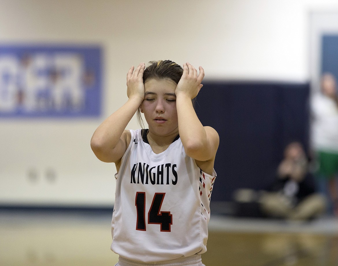 LISA JAMES/ PressAlyssa SiJohn of Lakeside collects herself before making her free throw in the last seconds of their 1A Division 2 District 1 girls basketball championship game against Genesis Prep at Timberlake High School Thursday night.